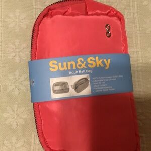Sun & Sky Crossbody. Red &  orange in color.